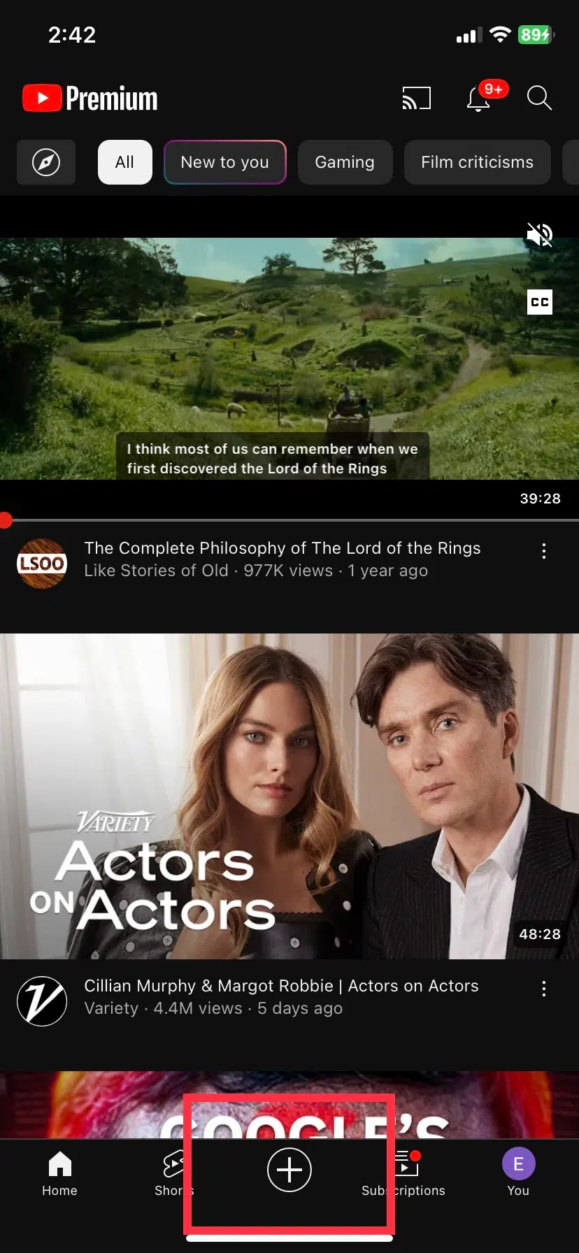 Plus icon on the main page of the YouTube app, used for creating new content.